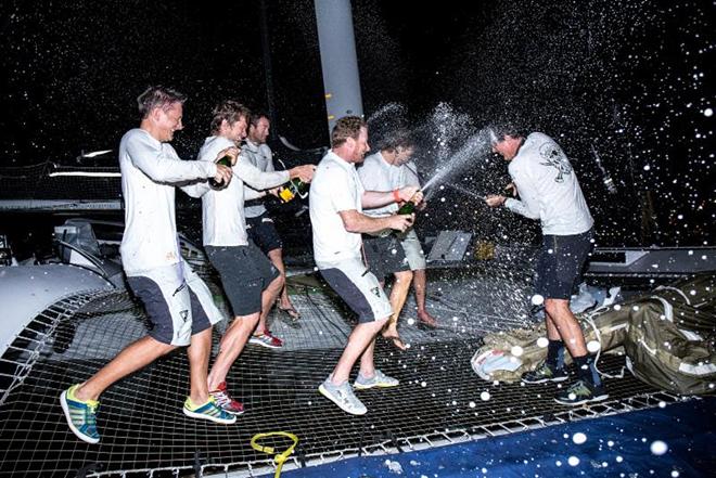Champagne celebrations on Phaedo3 © RORC/Arthur Daniel