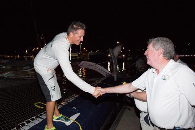 RORC Admiral, Andrew McIrvine greets Team Phaedo on the dock at Camper and Nicholsons Port Louis and welcomes Navigator, Miles Seddon © RORC/Arthur Daniel