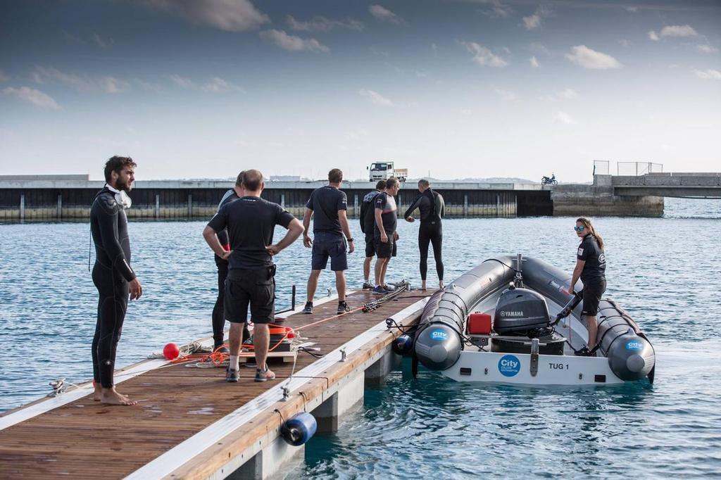 Shore team checks on the new MDL Marinas pontoon in Bermuda - Land Rover BAR, December 2016 Bermuda © Alex Palmer