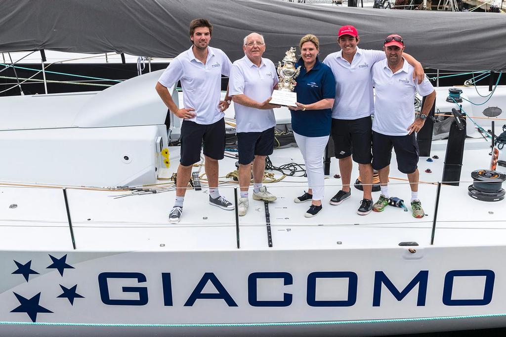 Collecting the all-important silverware on board their Volvo 70, Giacomo, so named for Jim's dad. - Rolex Sydney Hobart Yacht Race photo copyright Andrea Francolini taken at  and featuring the  class