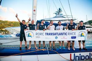 Giovanni Soldini and team celebrate finishing the RORC Transatlantic Race photo copyright RORC/Arthur Daniel taken at  and featuring the  class