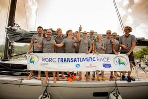Three cheers and a warm welcome dockside for Aragon who finished the race in Port Louis. After IRC time correction, the Dutch Maxi is leading the race for the RORC Transatlantic Race Trophy photo copyright RORC/Arthur Daniel taken at  and featuring the  class