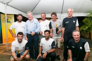 RORC Admiral, Andrew McIrvine, Giovanni Soldini and the crew of MOD70 Maserati at Port Louis Marina's Victory Bar for the Multihull prizegiving – RORC Transatlantic Race photo copyright RORC/Arthur Daniel taken at  and featuring the  class