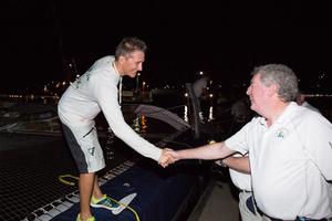 RORC Admiral, Andrew McIrvine greets Team Phaedo on the dock at Camper and Nicholsons Port Louis and welcomes Navigator, Miles Seddon photo copyright RORC/Arthur Daniel taken at  and featuring the  class