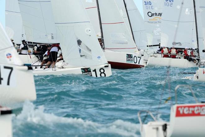 Off the start crowds in the J/70 Class - Quantum Key West Race Week 2017 © PhotoBoat.com