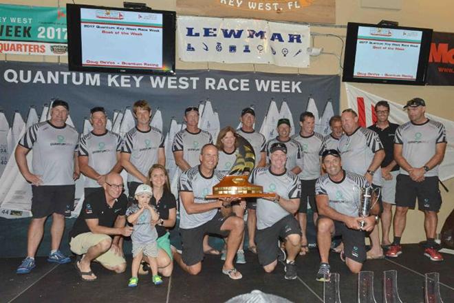 Doug De Vos (center, kneeling) and the Quantum Racing team received overall Boat of the Week honors © Quantum Key West Race Week / PhotoBoat.com