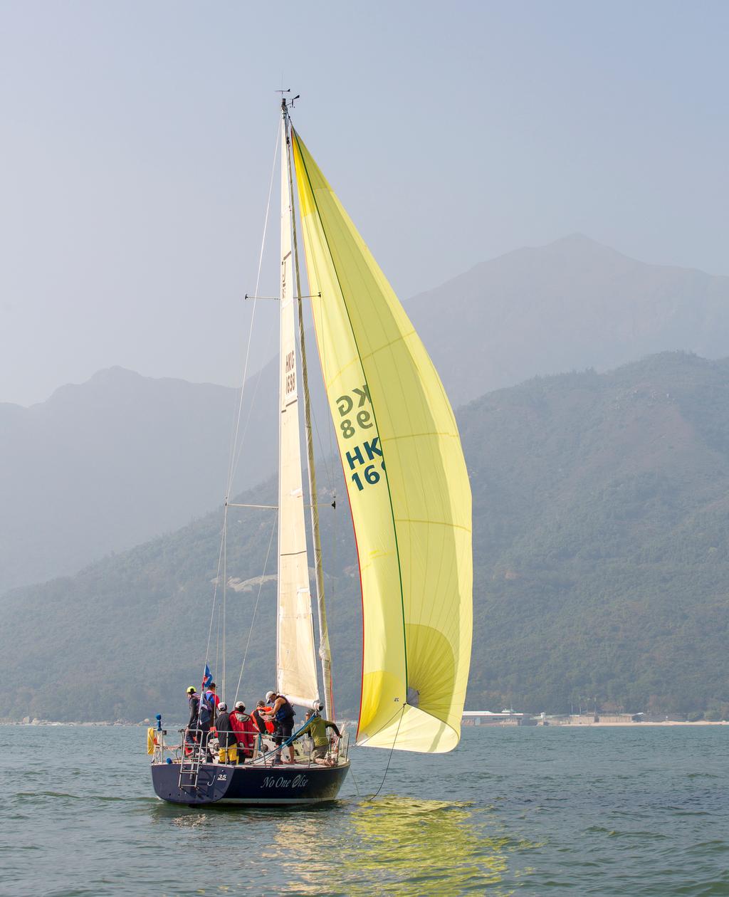 No One Else, first boat to arrive at Cheung Sha. Lantau Peak in the background. Beneteau Four Peaks Race 2017 © Guy Nowell / ABC