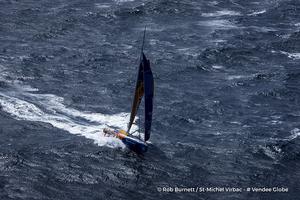 Aerial shot of Jean-Pierre Dick (FRA), skipper St-Michel Virbac, off Bass Strait in Tasmania, during the Vendee Globe, solo sailing race around the world, on December 14th, 2016 photo copyright Rob Burnett / St-Michel Virbac / Vendee Globe taken at  and featuring the  class