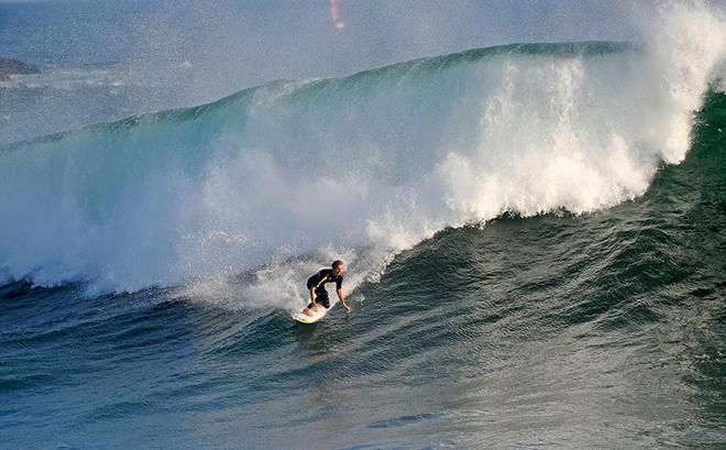NEWPORT BEACH, CA - SEPTEMBER 01:  A surfer rides a high wave at The Wedge on September 1, 2011 in Newport Beach, California. Waves measuring up to 20 feet pounded the beach. A winter storm off the coast of Australia and New Zealand brought unusually high surf to the Southern California beaches.  (Photo by Kevork Djansezian/Getty Images) © Getty Images