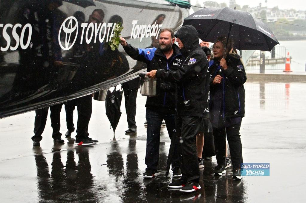 Greg Horton (left) Sir Stephen Tindall and Tina Symmans (holding umbrella) as Board members bless the AC50 - Emirates Team New Zealand AC 50 launch ceremony at the  Team's base in Auckland.  February 16, 2017 photo copyright Richard Gladwell www.photosport.co.nz taken at  and featuring the  class