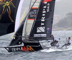 The Triple M team fall back into the water when the breeze left them - 18ft Skiffs - JJ Giltinan Championship 2017 photo copyright 18footers.com taken at  and featuring the  class