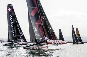 Old Swiss rivals - Alinghi and Team Tilt - GC32 Championship photo copyright Jesus Renedo / GC32 Championship Oman taken at  and featuring the  class