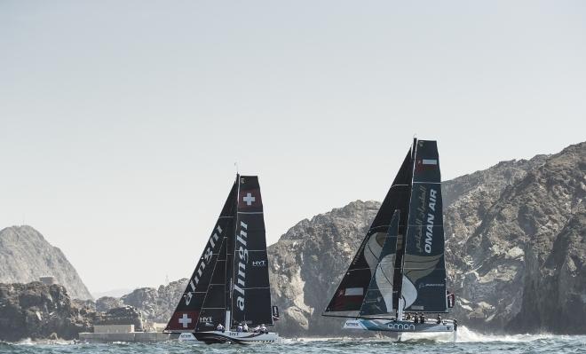 The fleet racing close to the shore and historic town of Mutrah - Extreme Sailing Series © Lloyd Images http://lloydimagesgallery.photoshelter.com/