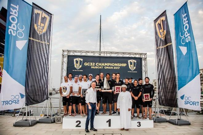 The podium with Rashid Al Kindi (see his title left) and David Graham, CEO of Oman Sail - GC32 Championship © Jesus Renedo / GC32 Championship Oman