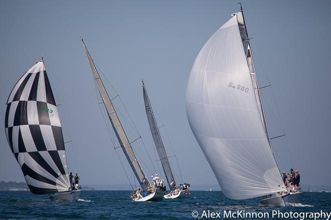 Martini Racing (L) and Dark Energy (R) close in on the leeward gate as others already begin the return voyage to weather again. - Club Marine Series ©  Alex McKinnon Photography http://www.alexmckinnonphotography.com