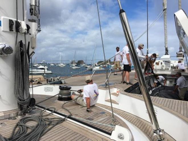 Getting the spinnaker out of one of the forward hatches - St. Barth’s Super Yacht Regatta 2017 © Carlo Borlenghi / Perini Navi