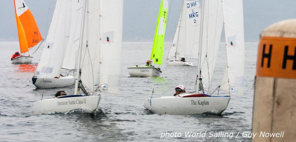 World Sailing Paralympic Development Programme, Hong Kong. Close racing at the top mark.  © Guy Nowell / World Sailing