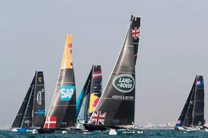 The fleet in action on the second day of racing in the Muscat stadium in Oman – Extreme Sailing Series photo copyright Lloyd Images http://lloydimagesgallery.photoshelter.com/ taken at  and featuring the  class