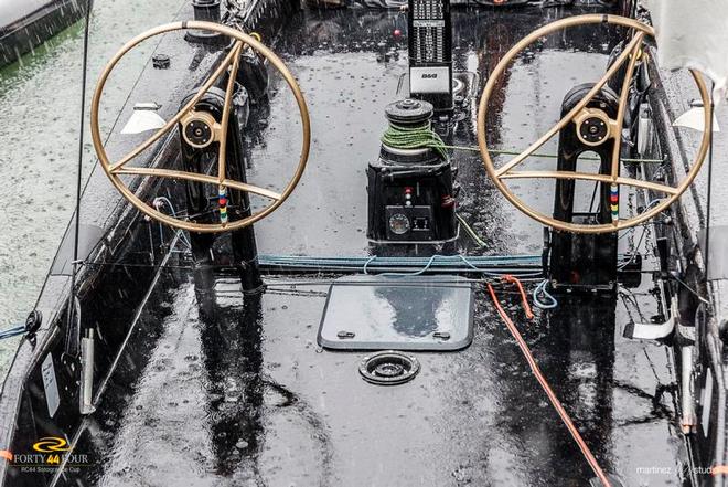 Team CEEREF's golden wheels get a thorough soaking in the torrential rain – RC44 Sotogrande Cup © Martinez Studio