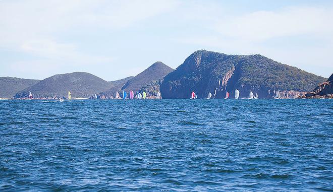 Part of the cruising fleet returning back into the Bay to complete the passage race. - Sail Port Stephens ©  John Curnow