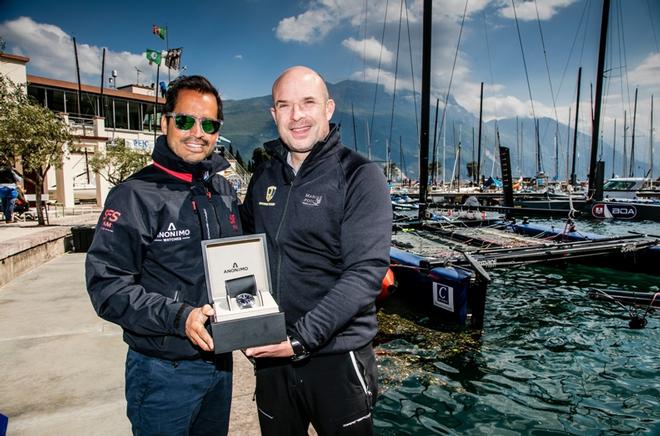 Christian Scherrer, GC32 Racing Tour Manager with Julien Haenny, CEO of Anonimo Watches SA and the new prize - an Anonmo Nautilo © Jesus Renedo / GC32 Racing Tour