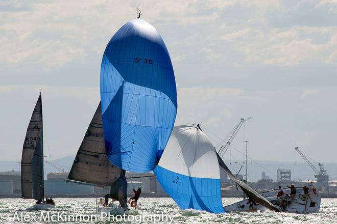 Oooooops! S Bell and J Sloan from SYC with Archie manage to hold their kite, whilst Richard Gates skippering Absolute from RYCV  is not doing so well... - Club Marine Series ©  Alex McKinnon Photography http://www.alexmckinnonphotography.com