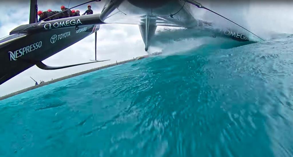 Emirates Team New Zealand submarines her leeward hull during a nosedive leaving harbour in Bermuda - April 26, 2017 © Emirates Team New Zealand http://www.etnzblog.com