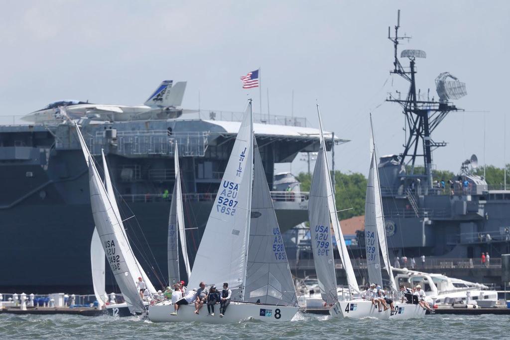 One of Race Week's newest innovations – a fourth inshore racecourse – meant sailing in the vicinity of the aircraft carrier U.S.Yorktown. © Tim Wilkes / Charleston Race Week