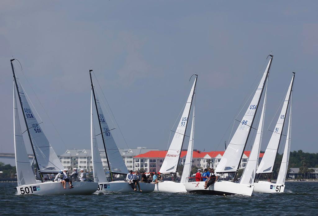 The J/70 fleet splits tacks racing in the shadow of the Ravenel Bridge on Thursday's practice race at Sperry Charleston Race Week. photo copyright Tim Wilkes / Charleston Race Week taken at  and featuring the  class