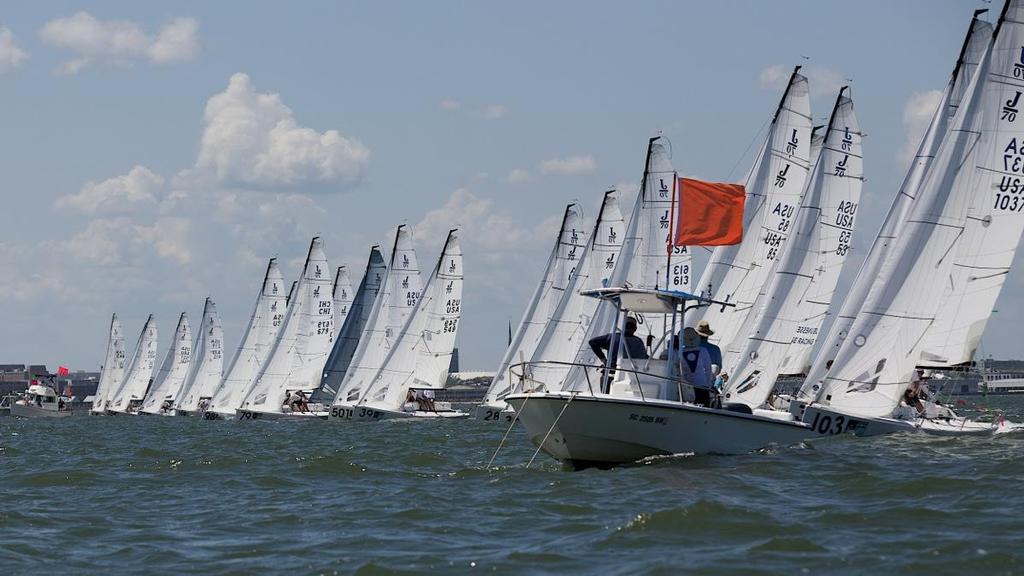 More than 70 boats comprise the J/70 fleet, the biggest of the regatta, shown starting off a crowded line in Charleston Harbor during the first day of racing at Sperry Charleston Race Week 2017. © Meredith Block/ Charleston Race Week http://www.charlestonraceweek.com/