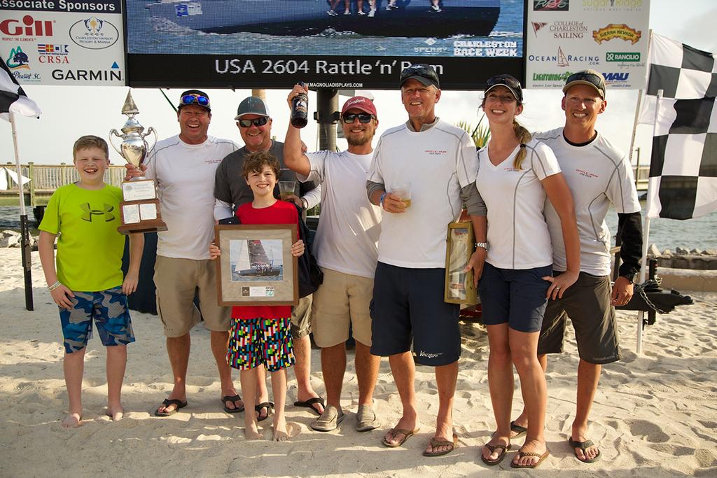 Mike Beasley (second from left) and his Annapolis, MD-based crew show their elation at winning the Palmetto Cup Perpetual Trophy, the overall award for best performance among handicap classes. They dominated a talented nine-boat class in Beasely's GP26 Rattle-n-Rum at Sperry Charleston Race Week 2017 © Meredith Block/ Charleston Race Week http://www.charlestonraceweek.com/