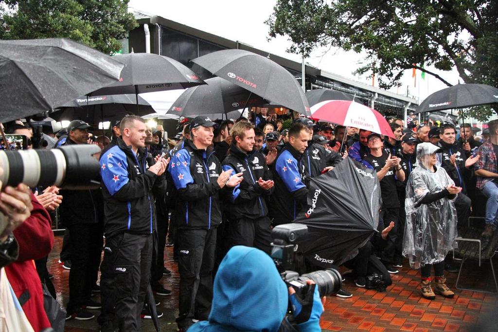 Emirates Team New Zealand - Sailing and Shore crew applaud as the rain buckets down - Parade in  Auckland,   July 6, 2017 © Richard Gladwell www.photosport.co.nz