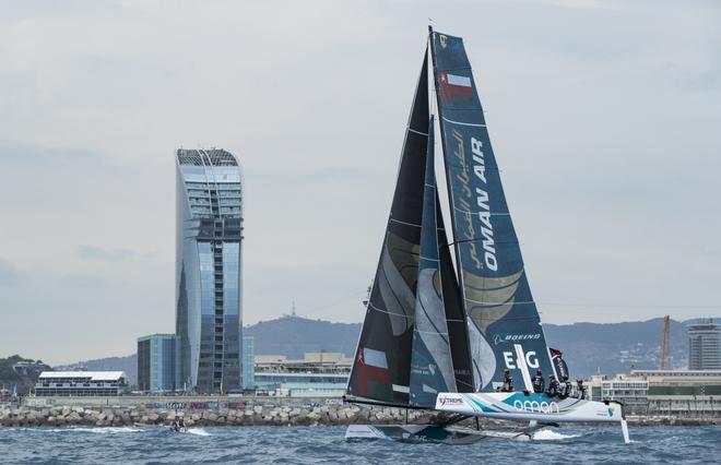 Oman Air Sailing Team skippered by Phil Robertson with team mates Pete Greenhalgh, Ed Smyth, Nasser Al Mashari and James Wierzbowski racing close to the city of Barcelona on day 4 of racing.  - 2017 Extreme Sailing Series Barcelona Act 4  © Lloyd Images http://lloydimagesgallery.photoshelter.com/