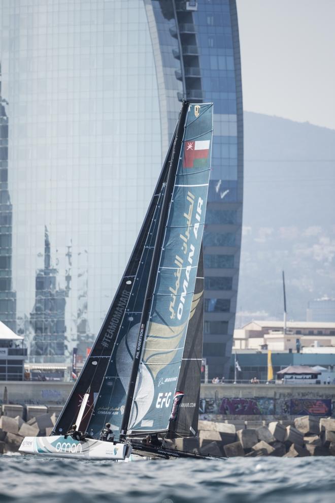The Extreme Sailing Series 2017. Act4. Barcelona, Spain. Oman Air Sailing Team skippered by Phil Robertson with team mates Pete Greenhalgh, Ed Smyth, Nasser Al Mashari and James Wierzbowski racing close to the city of Barcelona on Day 2 of racing. © Lloyd Images http://lloydimagesgallery.photoshelter.com/