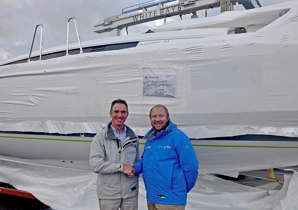 Lee Condell from Performance Boating Sales being congratulated by GM of White Bay 6, Jeremy Rose - Jeanneau 51 photo copyright Jeanneau Australia taken at  and featuring the  class
