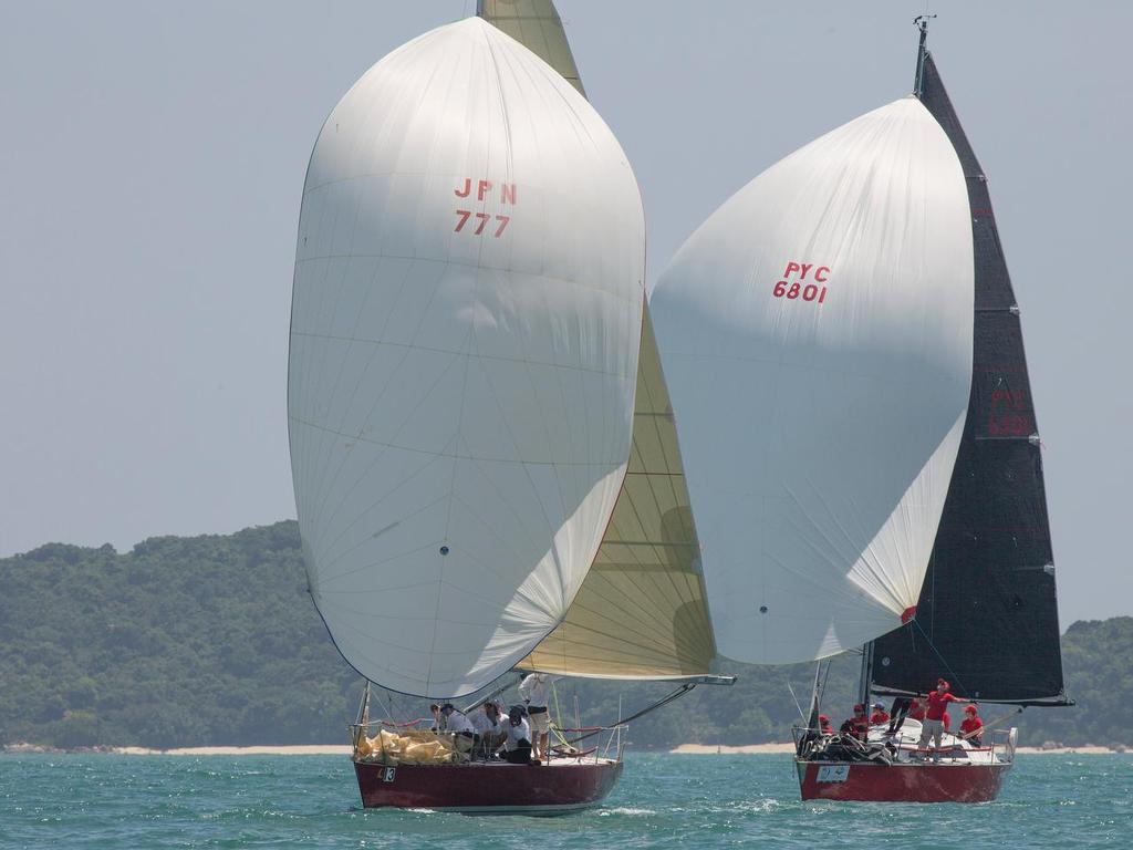 Hardly a biscuit between them. Phoenix keeps Farrgo Express at bay - just. Cape Panwa Hotel Phuket Raceweek 2014. photo copyright Guy Nowell / Cape Panwa Hotel Phuket Raceweek taken at  and featuring the  class