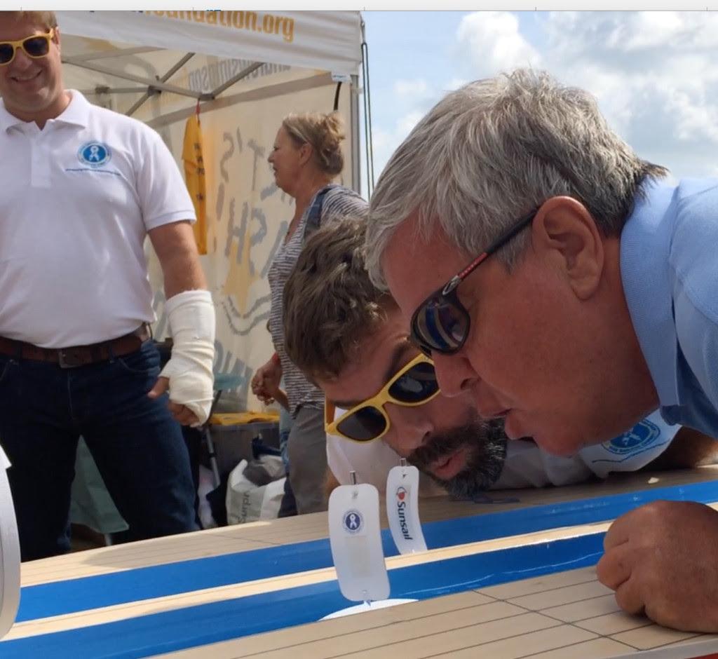 Olympic Gold medalist Ian Percy was literally blown away by Sir Keith Mills in the Gutter Boat Race. © BBC Solent