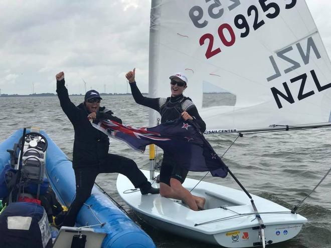 Josh Armit celebrates his U-17 win with coach Sara Winther at the Laser Radial Youth Worlds © SW
