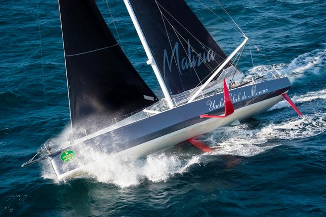 The Imoca 60, Malizia, shows off her underwater appendages as she heads upwind – Rolex Fastnet Race © Quinag