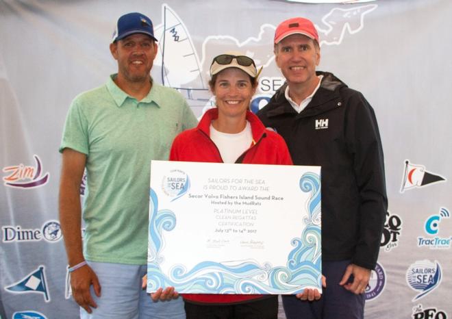 Regatta organizers of the Secor Volvo Fishers Island Sound Race receiving their Platinum Level Certification. From left to right regatta chairman Brandon Flack, sustainability lead Julia Cronin, and president of Sailors for the Sea, R. Mark Davis ©  SVFISR