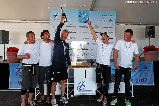 Happy team of Maidollis celebrating their victory at the 20th Melges 24 World Championship with the historical Melges Performance Sailboats perpetual trophy  ©  Pierrick Contin http://www.pierrickcontin.fr/