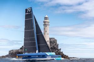 First around the Fastnet Rock and Multihull Line Honours for Tony Lawson's MOD70 Concise 10 photo copyright  Rolex/ Kurt Arrigo http://www.regattanews.com taken at  and featuring the  class
