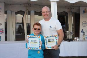 Tom and Stuart Phillips, winners of the Parent and Child Handicap – Learning and Skills Solutions Pyefleet Week photo copyright  Mandy Bines taken at  and featuring the  class