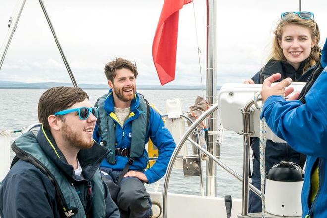 Trust Ambassador and Olympic sailor, Luke Patience, on board with some of the young people during an earlier leg of Round Britain © Ellen MacArthur Cancer Trust