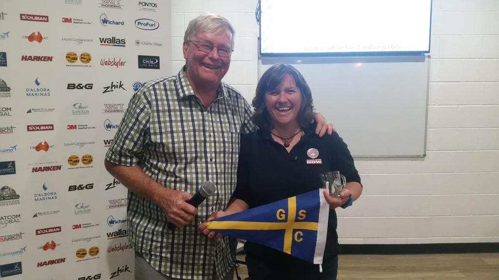 Lisa Blair is presented with a Gosford Sailing Club burgee and mug by David Slingsby. - Lisa Blair shares story at Gosford Sailing Club photo copyright Peter McIntosh taken at  and featuring the  class