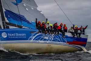 The Russians celebrate their win in the final leg to St Petersburg – Nord Stream Race photo copyright  Andrey Sheremetev / Nord Stream Race taken at  and featuring the  class