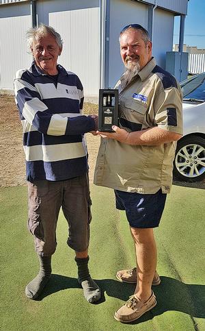Jon receiving a bottle of 10 year old Bundaberg Rum from Michael who has followed Jon since his first circumnavigation, has read every word written by and about Jon photo copyright Maree Stainton taken at  and featuring the  class