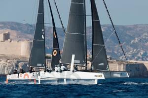 American Jason Carroll's Argo leads Simon Delzoppo's .film Racing from Australia in training on Marseille's Rade Sud – Marseille One Design photo copyright  Gilles Martin-Raget / GC32 Racing Tour taken at  and featuring the  class