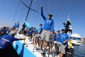Charlie Enright waves to the crowd in Alicante – Volvo Ocean Race photo copyright  Atila Madrona / Vestas 11th Hour Racing taken at  and featuring the  class