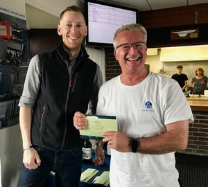 General Manager of The Bugle Hamble, presents Blackjack's Andy Howe with his prize – Hamble Winter Series photo copyright  Louay Habib / Hamble Winter Series taken at  and featuring the  class